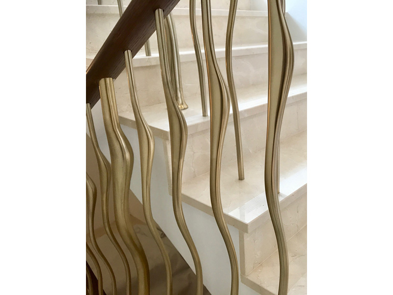 Wisp sculptural balustrade in hand-polished cast solid aluminium, finished in Golden Brass (zigzagdesignstudio.co.uk)