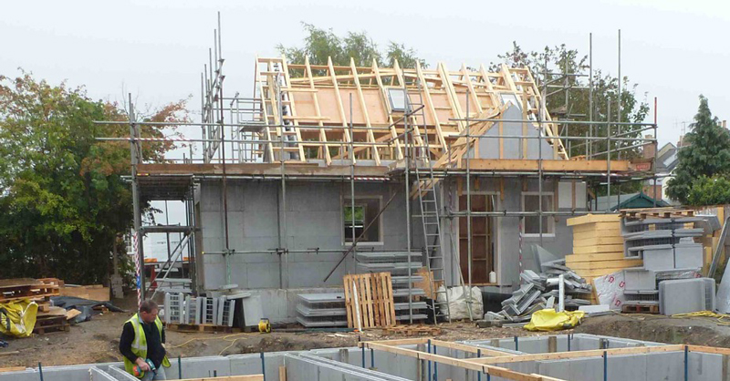 housebuild site scaffolding in place