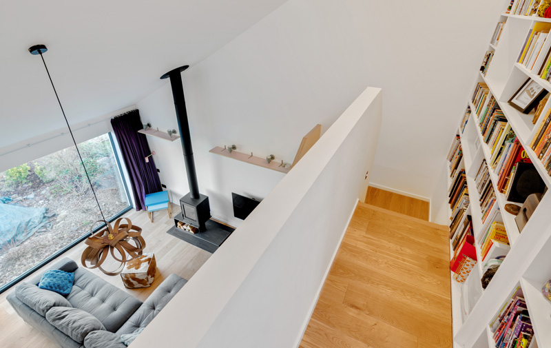 Upward-and-Outward-looking-from-the-book-lined-landing-down-into-the-sittting-area.jpg